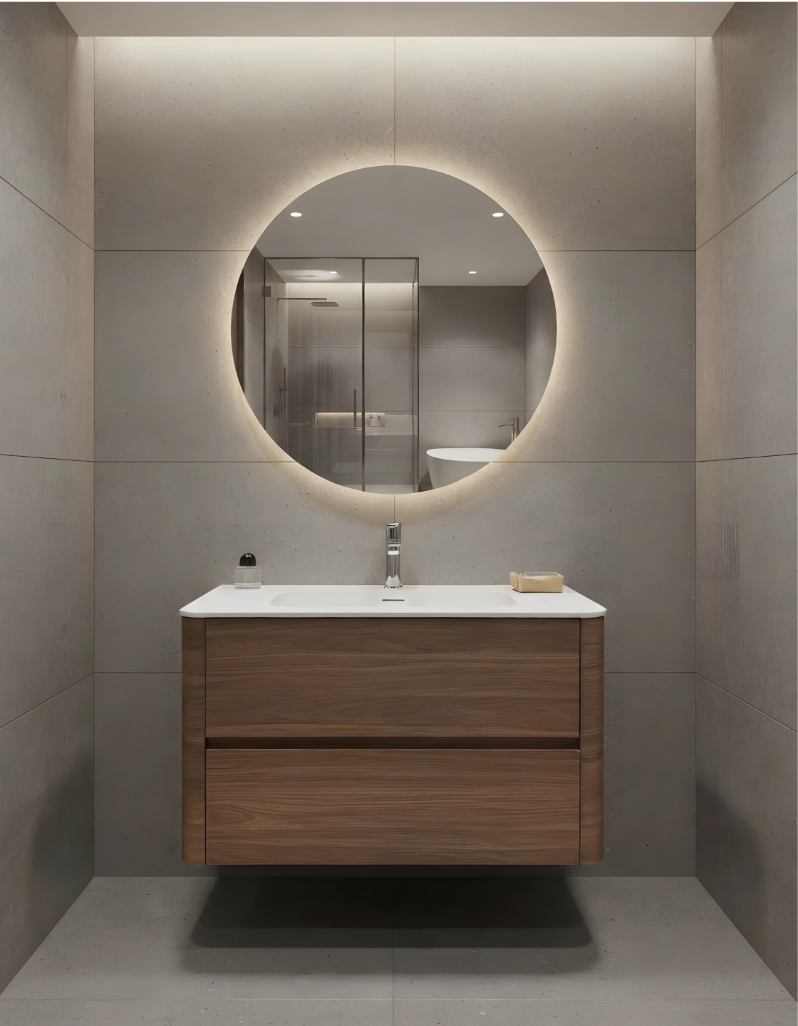 Wall-hung timber vanity with an integrated basin and round backlit mirror