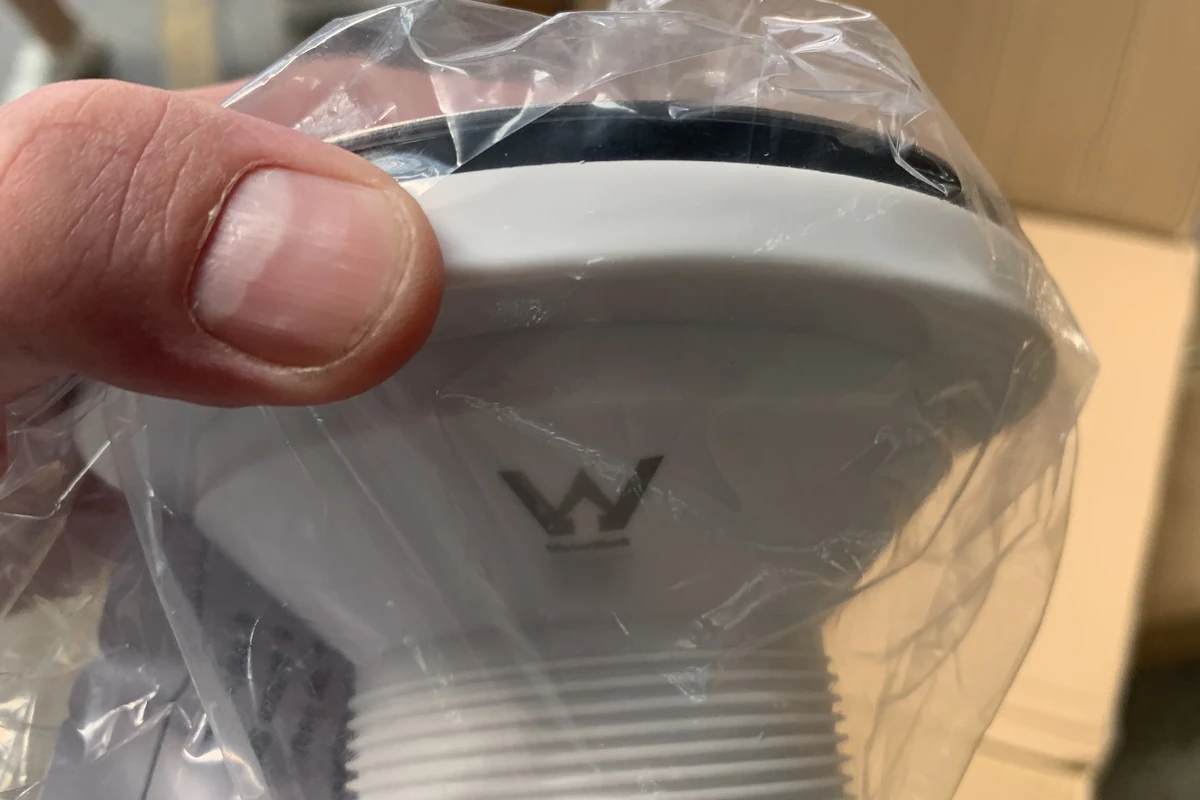 WaterMark certification mark and licence number moulded into a plumbing fitting